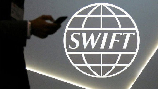SWIFT тестирует токены XRP и HBAR для трансграничных платежей